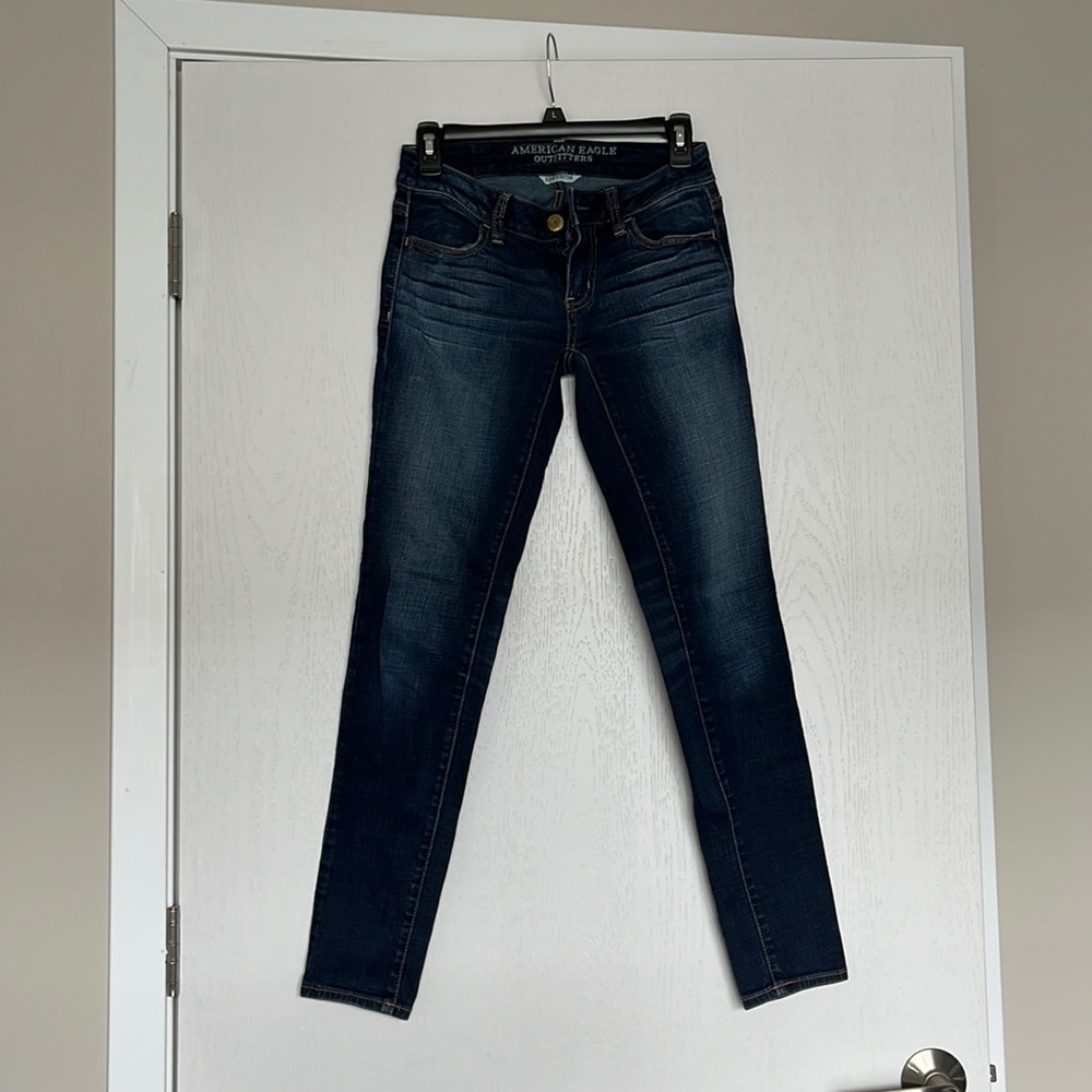 American eagle dark wash jeans, super stretch jegging, size 0.